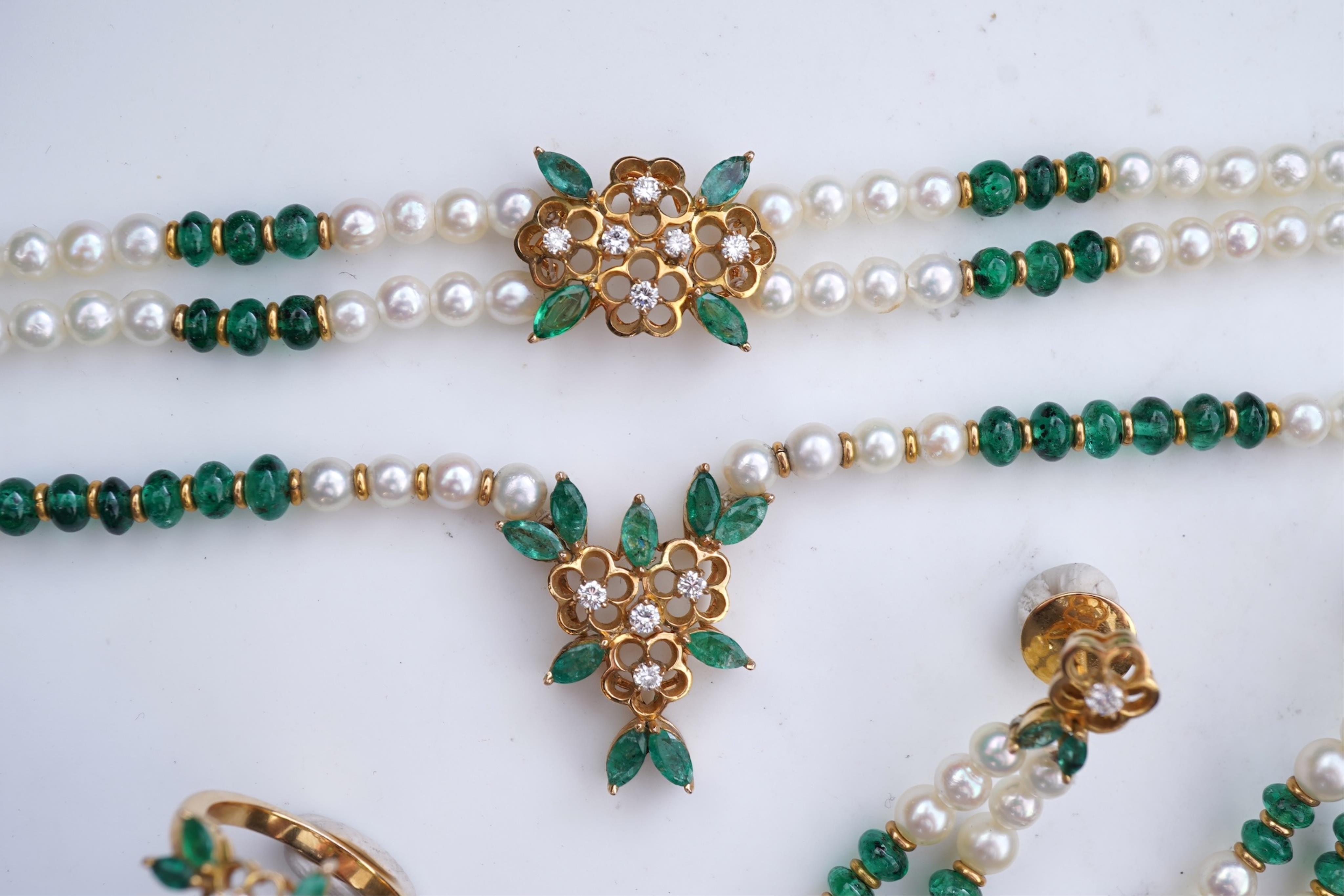 A cultured pearl, emerald and diamond parure